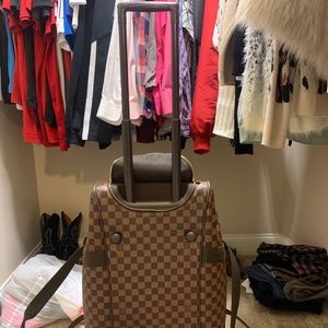 COPY - Louis Vuitton rolling duffle bag